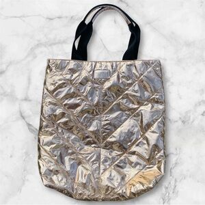 Victoria’s Secret gold bag